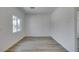 A bright, airy bedroom featuring neutral tones and wood-look flooring at 383 N 16Th St, Las Vegas, NV 89101