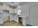 Bright kitchen with white cabinets, light countertops, and modern black hardware at 383 N 16Th St, Las Vegas, NV 89101