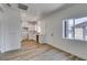 A well-lit room showing the kitchen area and sleek flooring at 383 N 16Th St, Las Vegas, NV 89101