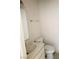 A half bathroom featuring a single sink, vanity, toilet, and a mirror at 4338 Caliente St # 12, Las Vegas, NV 89119