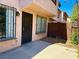 Charming front entrance features a secure gate and convenient access to the home's main entry door at 4338 Caliente St # 12, Las Vegas, NV 89119