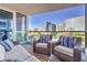 Relaxing outdoor balcony with comfortable seating and panoramic views of the city skyline at 4575 Dean Martin Dr # 1112, Las Vegas, NV 89103