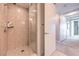 Tiled walk-in shower with glass door and shampoo niche in the bathroom at 4575 Dean Martin Dr # 1112, Las Vegas, NV 89103
