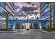 Entrance featuring a 'Panorama' sign between two residential buildings and palm trees at 4575 Dean Martin Dr # 1112, Las Vegas, NV 89103