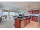 Modern kitchen with breakfast bar seating, open to living area at 4575 Dean Martin Dr # 1112, Las Vegas, NV 89103