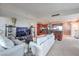 Open living space with sofas, TV area, connects to kitchen at 4575 Dean Martin Dr # 1112, Las Vegas, NV 89103