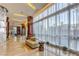 Bright lobby featuring large windows, columns, modern decor and marble floors at 4575 Dean Martin Dr # 1112, Las Vegas, NV 89103