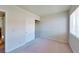 A cozy bedroom features neutral walls, carpeted floors, and a closet for storage at 4990 River Glen Dr # 171, Las Vegas, NV 89103