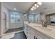 Modern bathroom featuring a double vanity and walk-in shower at 53 Precipice Ct, Henderson, NV 89002
