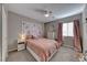 Charming bedroom with pink accents and a floral headboard at 53 Precipice Ct, Henderson, NV 89002