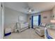 Adorable Bedroom with a crib, soft chair, and aviation-themed decor, perfect for a room at 53 Precipice Ct, Henderson, NV 89002