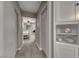 Hallway leading to a bedroom, with built-in shelving at 53 Precipice Ct, Henderson, NV 89002
