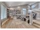 Open living area featuring beautiful hardwood floors, custom shelving, and lots of natural light at 53 Precipice Ct, Henderson, NV 89002