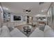 Inviting living room with a built-in media center, lots of seating, and an open floor plan at 53 Precipice Ct, Henderson, NV 89002
