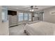 Bright bedroom with a door to the outside, a large bed and dressers at 53 Precipice Ct, Henderson, NV 89002