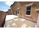 Home exterior of backyard with patio and gravel area at 5713 Heineken Dr, North Las Vegas, NV 89031
