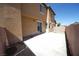 Exterior of home showcasing the backyard with a large concrete patio at 5713 Heineken Dr, North Las Vegas, NV 89031
