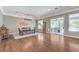 Bright dining room with modern lighting and access to the backyard creates a perfect setting for Gathering meals and entertaining at 5913 Audria Falls Ave, Las Vegas, NV 89131