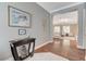 Elegant foyer showcases wood floors and flows into an open-concept living space at 5913 Audria Falls Ave, Las Vegas, NV 89131