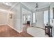 Welcoming foyer with hardwood floors and a view into a bright and spacious room at 5913 Audria Falls Ave, Las Vegas, NV 89131
