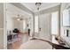 Inviting foyer with decorative accents, hardwood floors, and natural light creating a warm ambiance at 5913 Audria Falls Ave, Las Vegas, NV 89131