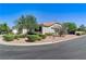 Charming front yard view with manicured shrubs and desert landscaping accents on a sunny day at 5913 Audria Falls Ave, Las Vegas, NV 89131