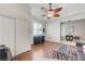Relaxing living room provides ample space and natural light with modern decor and hardwood flooring at 5913 Audria Falls Ave, Las Vegas, NV 89131