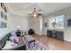 Cozy living room featuring stylish furnishings, a ceiling fan, and plenty of natural light at 5913 Audria Falls Ave, Las Vegas, NV 89131