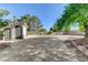 Large shed, suitable for storage or workshop space, sits in the property's backyard at 5913 Audria Falls Ave, Las Vegas, NV 89131