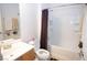 Clean bathroom with a shower-tub combination and a vanity with ample counter space at 5935 Saddle Horse Ave, Las Vegas, NV 89122