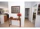 Hallway view showcasing interior design elements and access to the bathroom and bedroom at 5935 Saddle Horse Ave, Las Vegas, NV 89122
