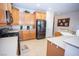Well-equipped kitchen featuring stainless steel appliances and ample cabinetry at 5935 Saddle Horse Ave, Las Vegas, NV 89122