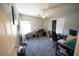 Neutral bedroom with a ceiling fan, closet, and space for a home office at 6040 Eganridge Ct, North Las Vegas, NV 89081