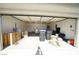 Spacious and clean garage space for parking and storage with an open door at 6040 Eganridge Ct, North Las Vegas, NV 89081