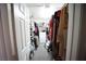 Walk-in closet with ample storage space, featuring shelves, drawers, and hanging rods at 6040 Eganridge Ct, North Las Vegas, NV 89081