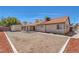 Exterior view of a home with a spacious, ready-to-landscape backyard at 6112 Blossom Knoll Ave, Las Vegas, NV 89108