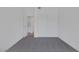Neutral bedroom with closet and open door, showcasing its features at 6112 Blossom Knoll Ave, Las Vegas, NV 89108