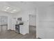 Well-lit kitchen with ample cabinet space, modern appliances, and wood-style flooring at 6112 Blossom Knoll Ave, Las Vegas, NV 89108