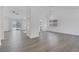 Bright, open-concept living room with new flooring, neutral walls, and lots of natural light at 6112 Blossom Knoll Ave, Las Vegas, NV 89108