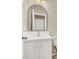 Modern bathroom featuring a sleek vanity with a marble countertop and modern mirror and lighting at 636 Pacific Cascades Dr, Henderson, NV 89012
