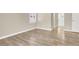 Spacious room with plank floors and a view into the ensuite bath area at 636 Pacific Cascades Dr, Henderson, NV 89012