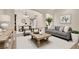 Comfortable living area with neutral tones, plush seating, and view into dining area for easy entertaining at 636 Pacific Cascades Dr, Henderson, NV 89012