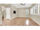 Open living room with wood floors, fan and plenty of natural light at 636 Pacific Cascades Dr, Henderson, NV 89012