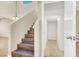 Staircase with wood flooring and a pendant light at 636 Pacific Cascades Dr, Henderson, NV 89012