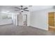 Bright and airy main bedroom with a fan, closet, and adjoining bathroom at 6517 Villa Mesa Dr, Las Vegas, NV 89107
