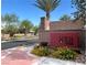 Entrance to Coral Bay, a B.H. Horton community, showcasing lush landscaping and attractive signage at 6682 Salt Pond Bay St, Las Vegas, NV 89149