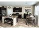 Eat-in kitchen area, stainless steel refrigerator, and lots of counter space for cooking at 6682 Salt Pond Bay St, Las Vegas, NV 89149