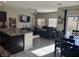 Bright and airy open-concept living space with a kitchen island, dining area, and a comfortable living room at 6867 Dragonfly Rock St, Las Vegas, NV 89148