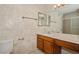 Bathroom featuring a shower-tub combo, toilet and vanity with framed mirror at 745 N Royal Crest Cir # 157, Las Vegas, NV 89169