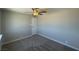 Neutral bedroom with carpet, ceiling fan, and a door at 745 N Royal Crest Cir # 157, Las Vegas, NV 89169